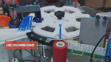 Automatic syringe labeling machine with thermal transfer printer | HG Robotics