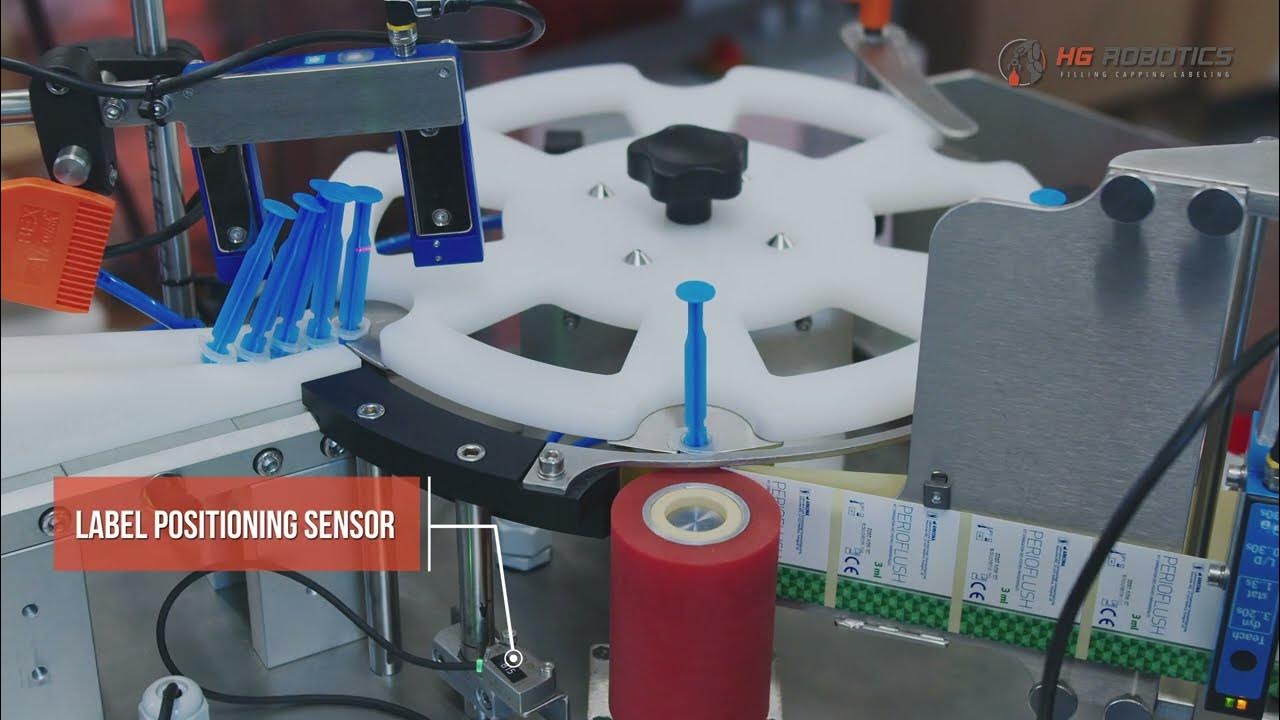 Automatic syringe labeling machine with thermal transfer printer HG