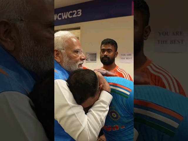 PM Modi embraces Mohammad Shami and encourages him and Team India after the CWC 2023 Final Loss class=