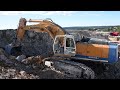 Liebherr 964c loading volvo a40g  part 1