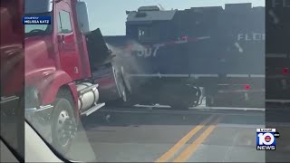 Video shows moments before train hits semi