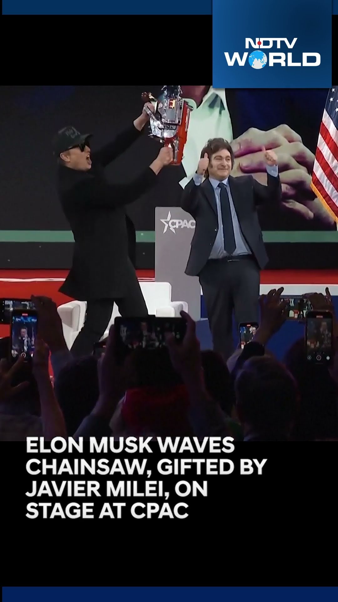 Elon Musk Chainsaw CPAC | Elon Musk Waves Chainsaw On Stage At CPAC