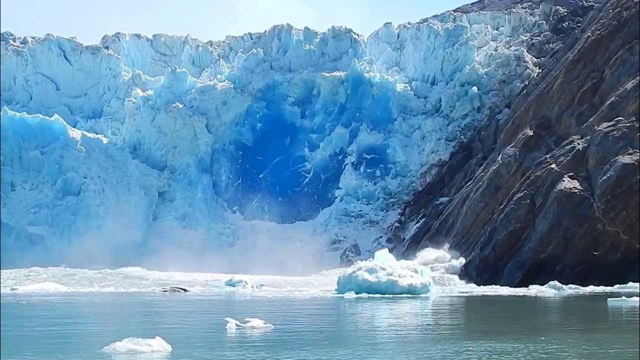 Massive Glacier Calving creating huge blue ice wall - Great event worth  watching 