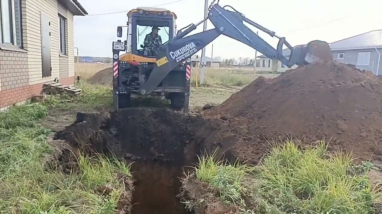 Рабочий день экскаватора погрузчика