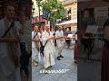 Happy singing hare krishna mantra believers on the pedestrian streets of budapest hindu mantra