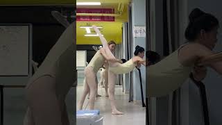 Students doing dance flexibility training