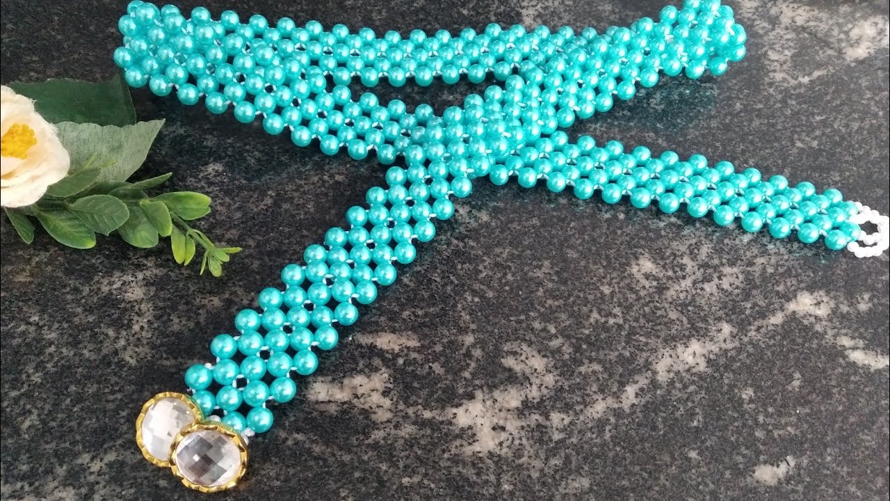 Como fazer cinto de pérolas com feixe de botão