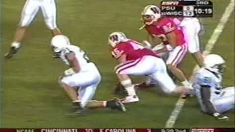 Matt Bernstein hurdles Penn State defender