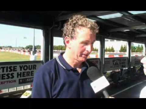 Ernie Merrick being interviewed after winning the Melbourne Victory race day.