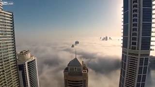 شاهد_القفز بين الغيوم من عمارة ناطحات سحاب في دبي روعة