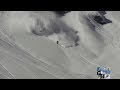 Snowboarding and skis  running from an avalanche