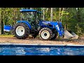 We got a tractor! New Holland Workmaster 75  12 speed, 4wd, air conditioning…