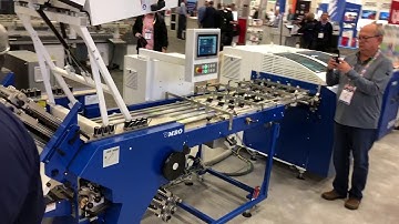 MBO Roll Fed SVC Finishing w/ Dynamic Perf & Score for 3 panel letters at Printing United, 52kph