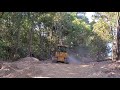 D4 Cat Dozer work, pushing down trees.