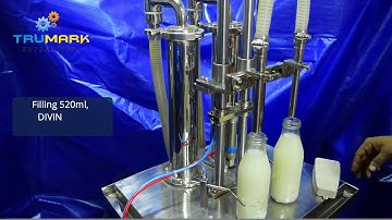 PLC based liquid filling machine [digital volume setting]