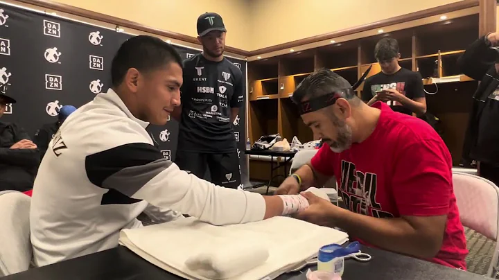 Vergil Ortiz fight night hand wrap with Manny Robl...