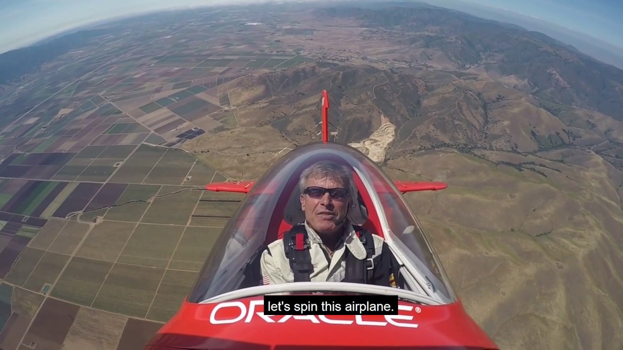 Aerobatic Champion Demonstrates Loops and Spins - YouTube