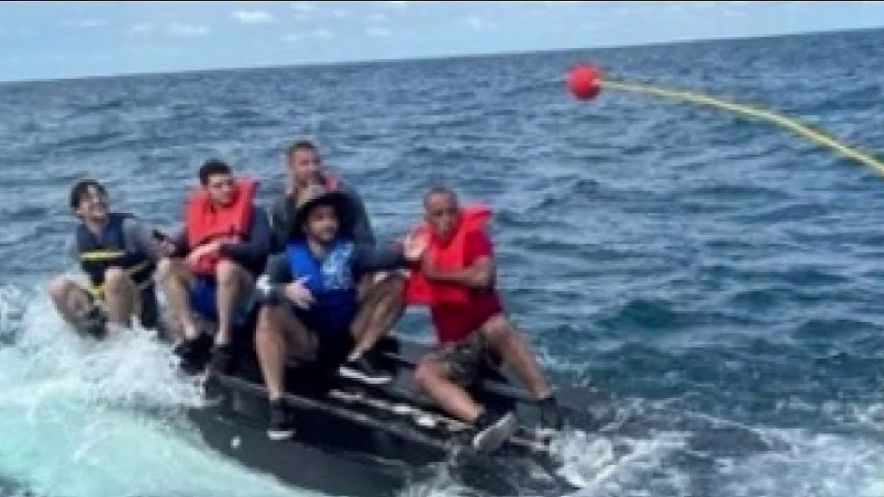 Coast Guard rescues 5 people from capsized vessel - YouTube