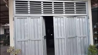 pintu lipat toko/garasi praktis murah dari baja ringan