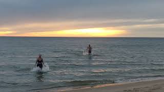 5-9-2023 cold water dip in Muskegon Michigan sunset