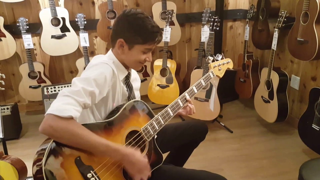 Slapping the bass Guitar Center!!! YouTube