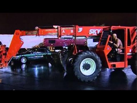 "Stone Cold" Steve Austin traps Triple H in his car and drops him high above using a forklift: Survi