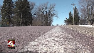 Investigation underway after body found on road near Sibley, IA
