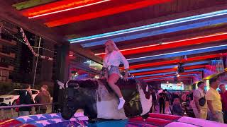 A Blonde Girl Riding On Al Bull In Benidorm | Bull Riding 4K
