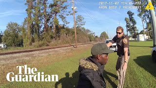 Ahmaud Arbery: police bodycam video shows failed attempt to use Taser in 2017 incident – exclusive