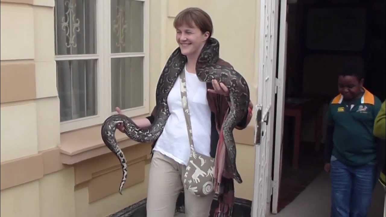Python giving Maru a hug in Swakopmund - YouTube