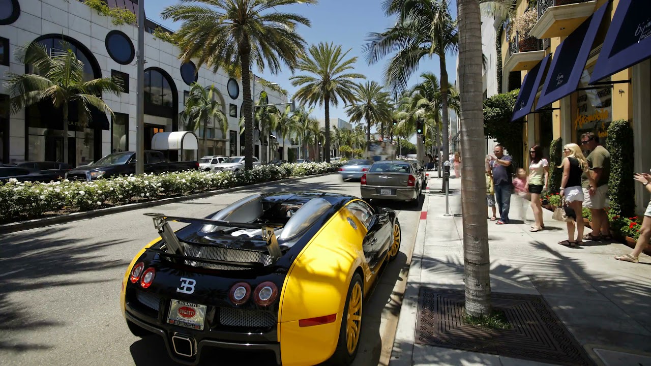 vehicles on rodeo drive beverly hills los angeles california - YouTube.