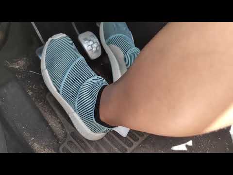 Kate is driving in Adidas NMD City sock