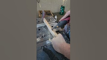 sanding a worn axe handle