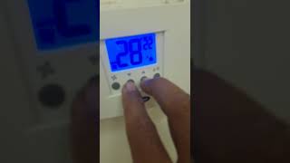 How to change carrier thermostate display light on/off programing .
