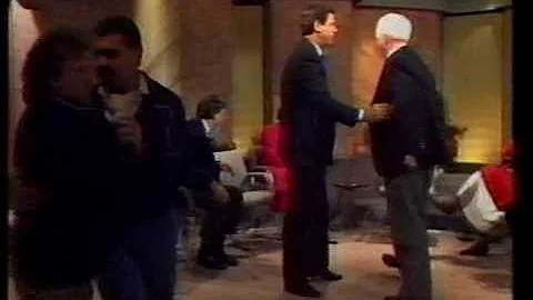Ron Casey And Normie Rowe Punch On The Midday Show.