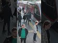 Security guard saves distracted woman from oncoming train in Turkey
