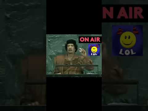 القذافي ينقذ الموقف و يساعد المترجم
