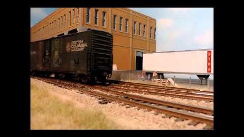Atlas O-Scale Union Pacific MP15 switching with a box car