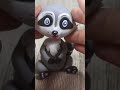 Raccoon out of fondant or clay  cake topper shorts
