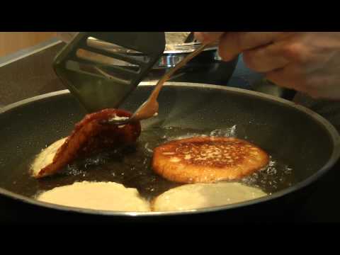 Grandma`s Cooking -German Tradition-Pancakes (potato pancakes) with apple sauce