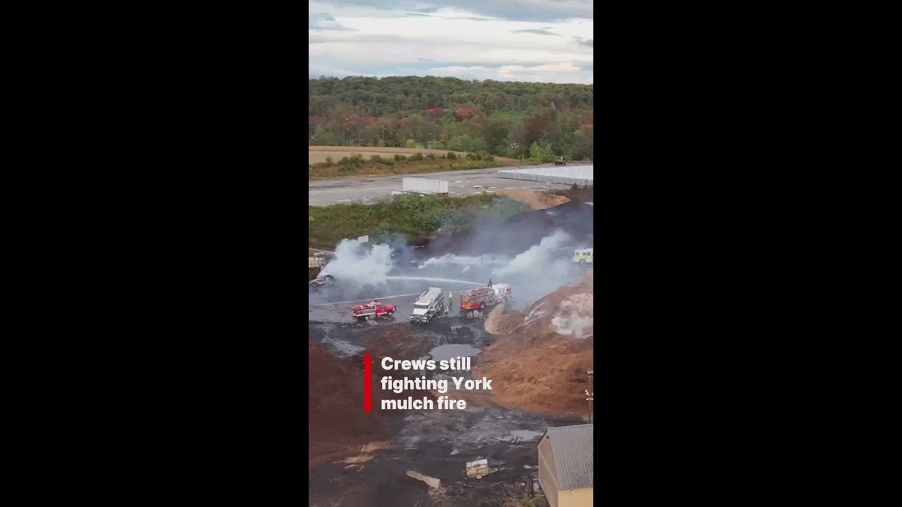 Mulch fire still smoldering