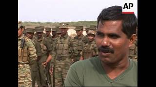 LTTE rebels perform live-fire exercise