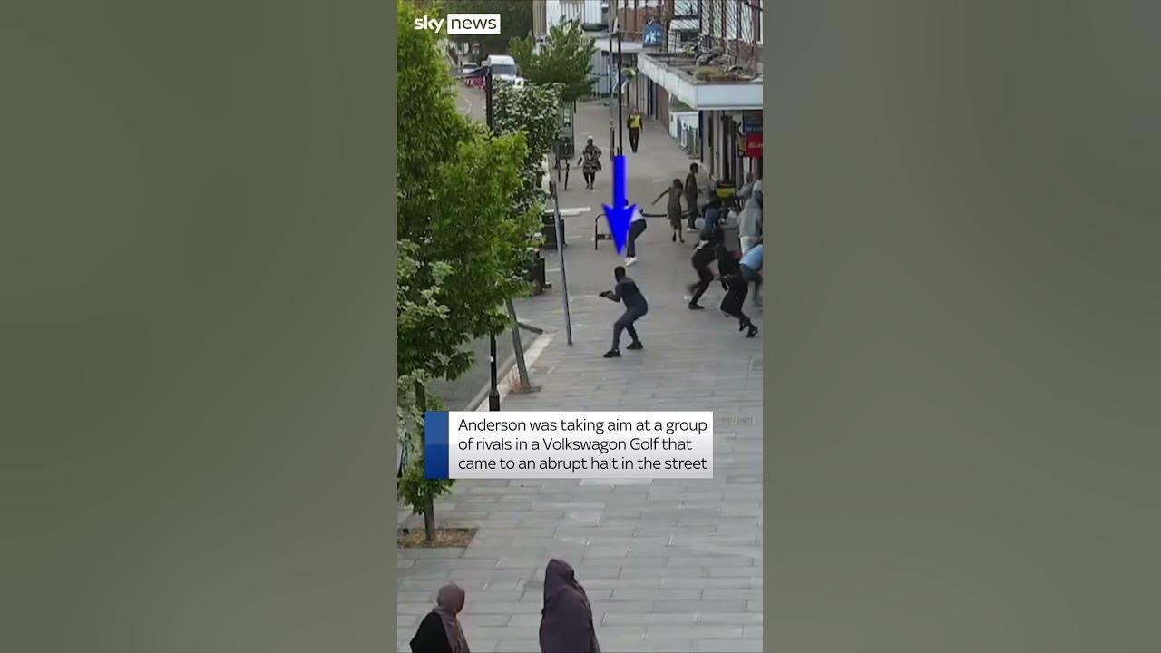 Moment man fires gun on busy street in north London