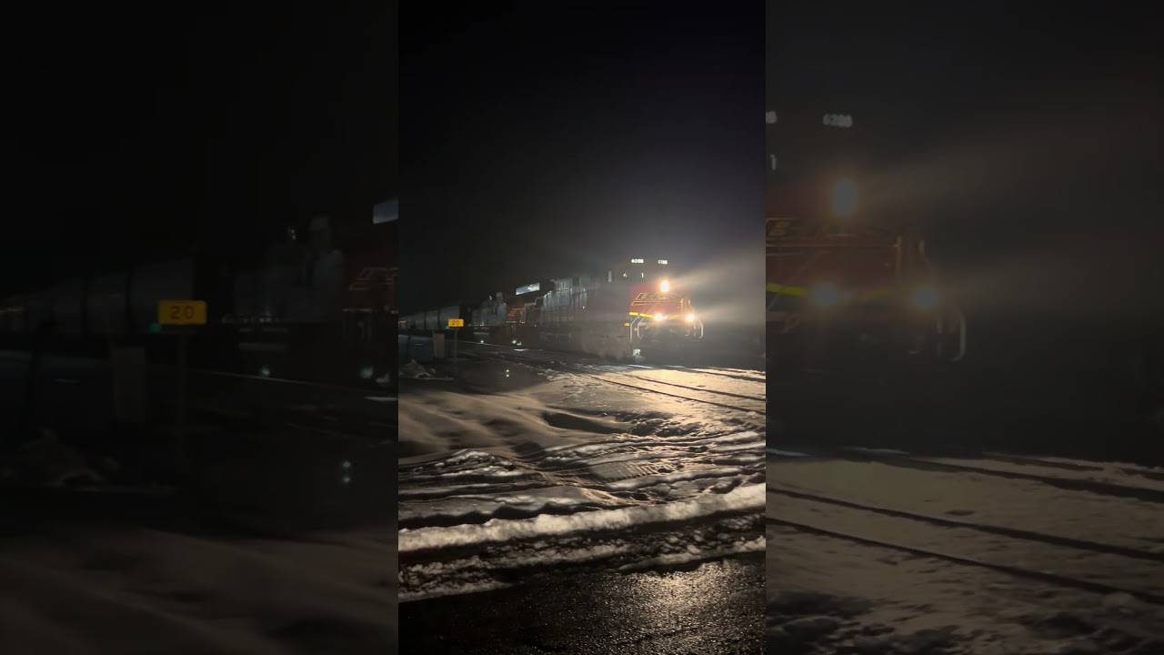 BNSF ES44AC 6208 and BNSF SD70ACE 8407 leading an empty mega grainer through Easton in thick fog.