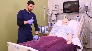 How to Hang an IV Piggyback (nursing skills)