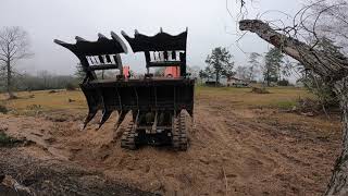 KUBOTA SVL 65-2 ROOT&#39;N with the MTL Talon grapple