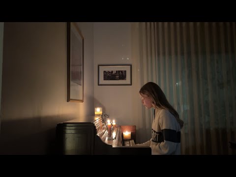 a cover of ''call your mom'' lit by candlelight