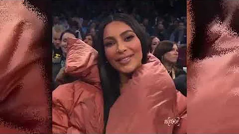 Watch As Things Got Awkward! Kim Kardashian Try To Kiss Kanye West At NBA Game, He Ignores Her