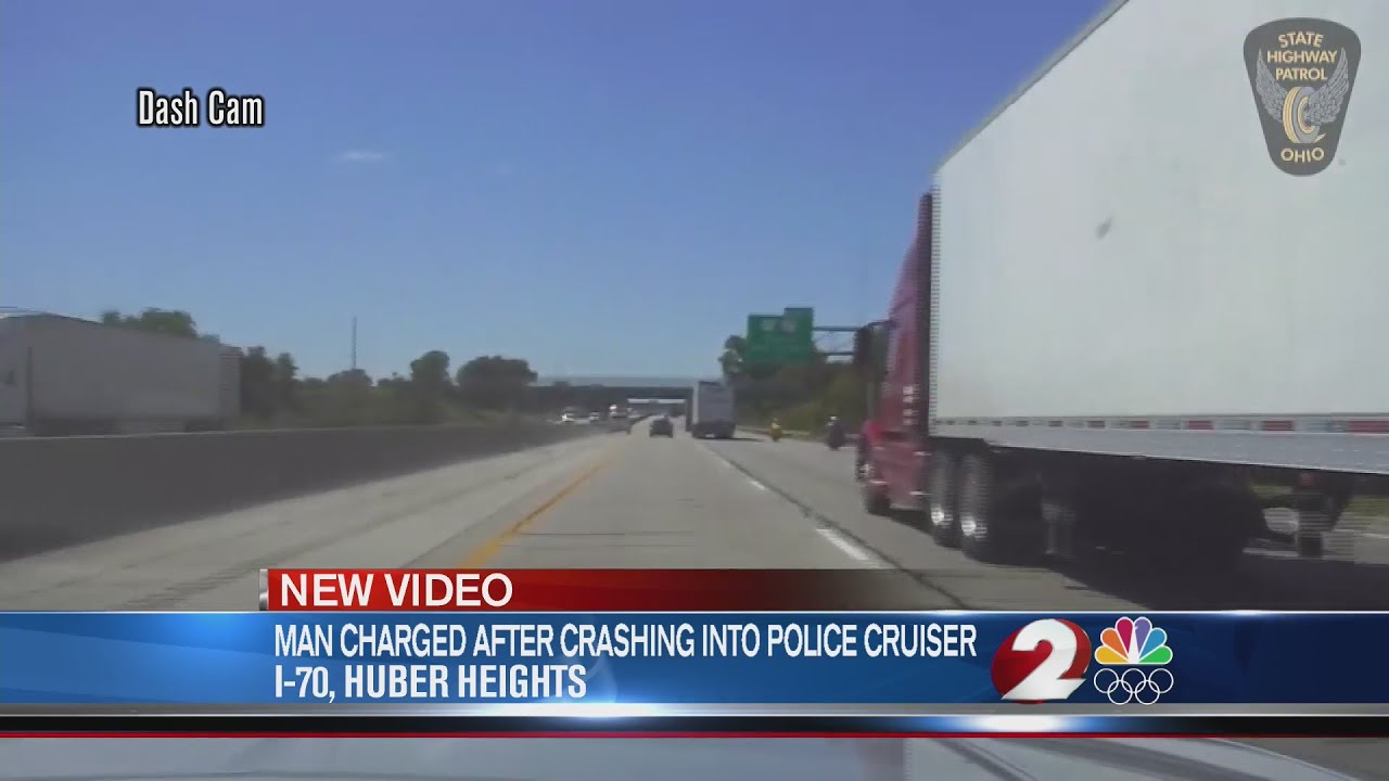 Man charged after crashing into police cruiser - YouTube