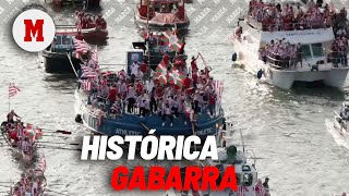 La gabarra acaba su recorrido rodeado de una impresionante marea rojiblanca